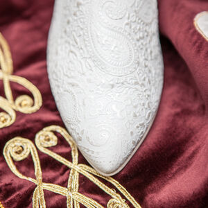 Chaussures des femmes en cuir à motifs « L’Adoubement »