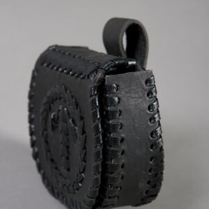 Vue de côté de petit sac avec les accents en cuir d'ArmStreet