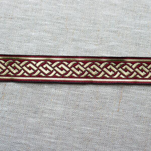 Passement celtique rouge doré à vendre au mètre