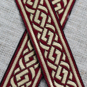 Passement celtique rouge doré à vendre au mètre